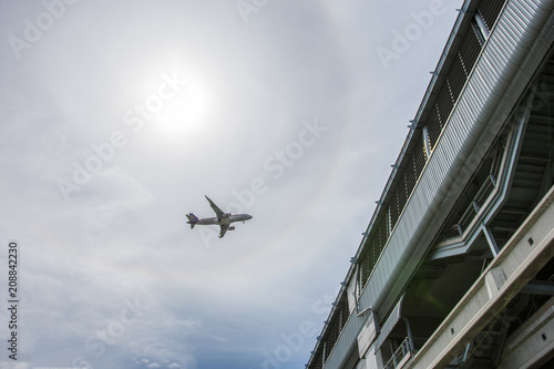 The plane is flying through the roof, with the sky as the background,on May 25 2018, bangkok thailand
