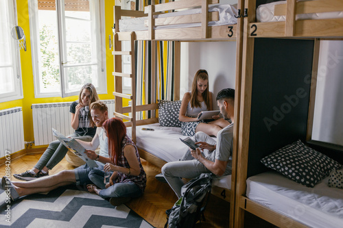 Young People in Hostel Bedroom photo