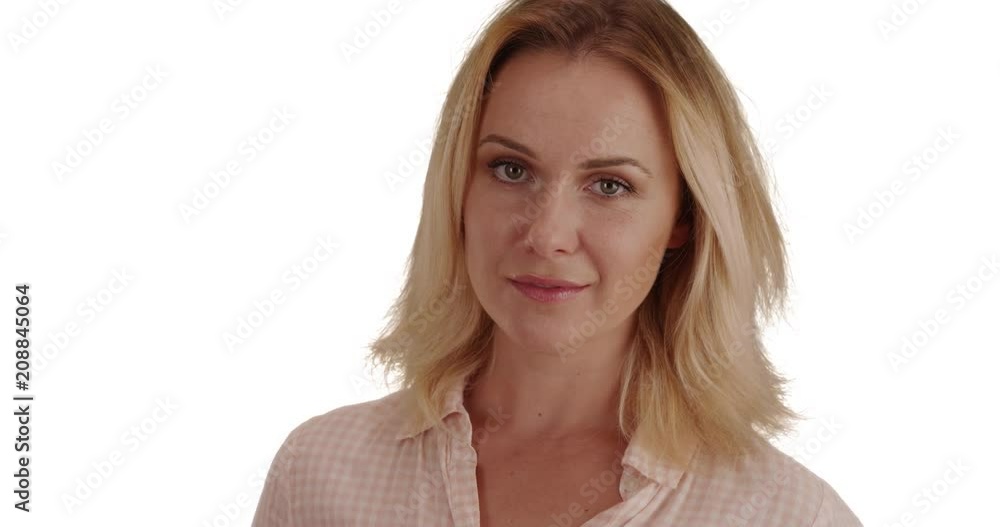Close-up portrait of pretty white lady looking at camera on white background, Good-looking blonde woman standing on white copy space alone gazing at camera, 4k Close-up portrait of pretty white lady looking at camera on white background, Good-looking blonde woman standing on white copy space alone gazing at camera, 4k