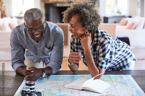 Senior African American Couple planning a trip in retirement photo