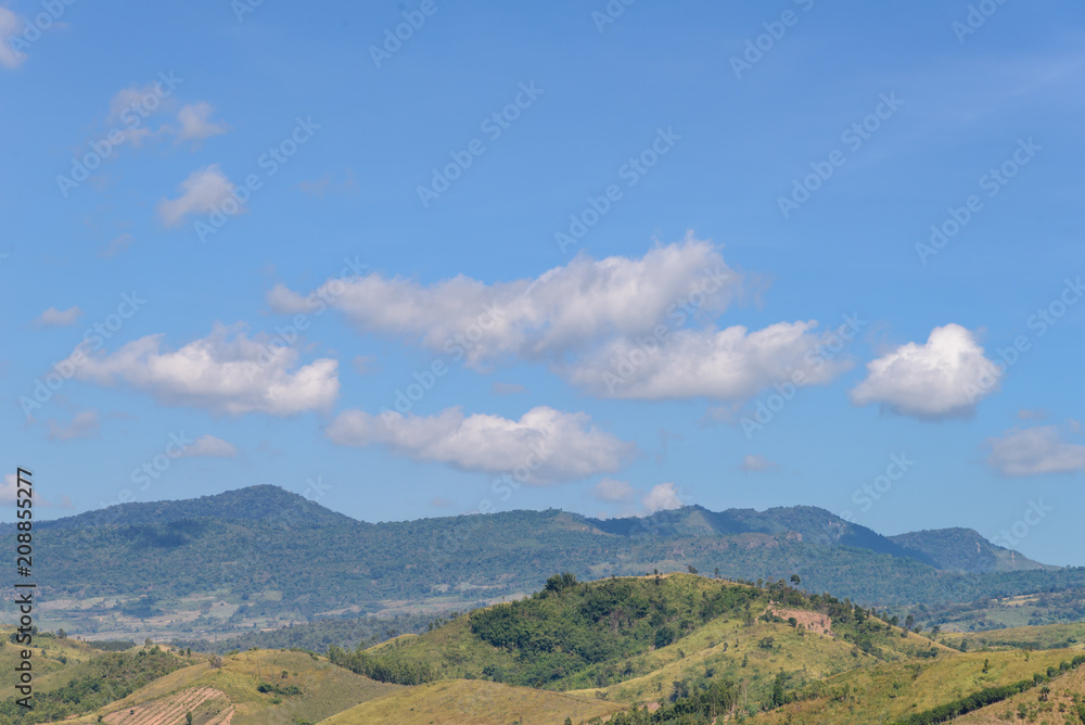Beautiful mountain landscape and meadows with nice blue sky and cloud on summer sunny day