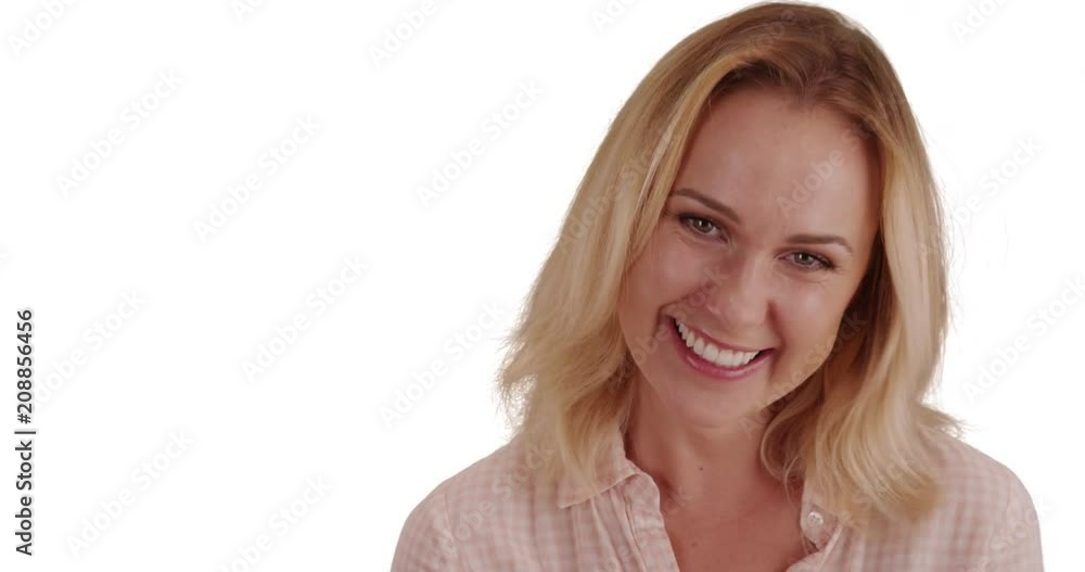 Close-up of cheerful white woman laughing happily on solid white background, Good-looking modern blonde female laughing at camera on white copy space, 4k Close-up of cheerful white woman laughing happily on solid white background, Good-looking modern blonde female laughing at camera on white copy space, 4k