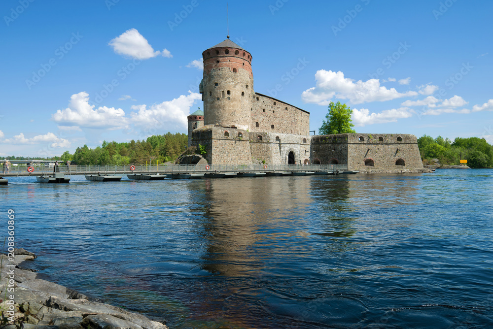 View of Olavinlinna fortress in the sunny June afternoon. Savonlinna, Finland