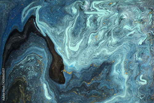 Marble abstract acrylic background. Blue marbling artwork texture. Agate ripple pattern. Gold powder. © anya babii