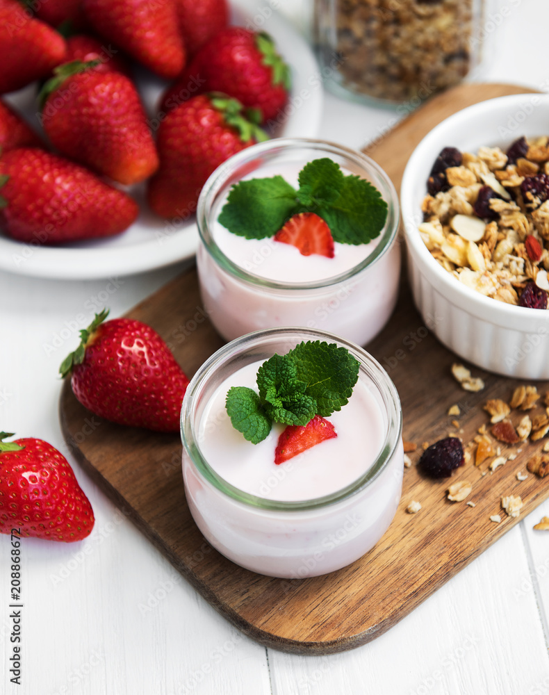 healthy breakfast, yogurt, fresh strawberries and granola healthy breakfast, yogurt, fresh strawberries and granola