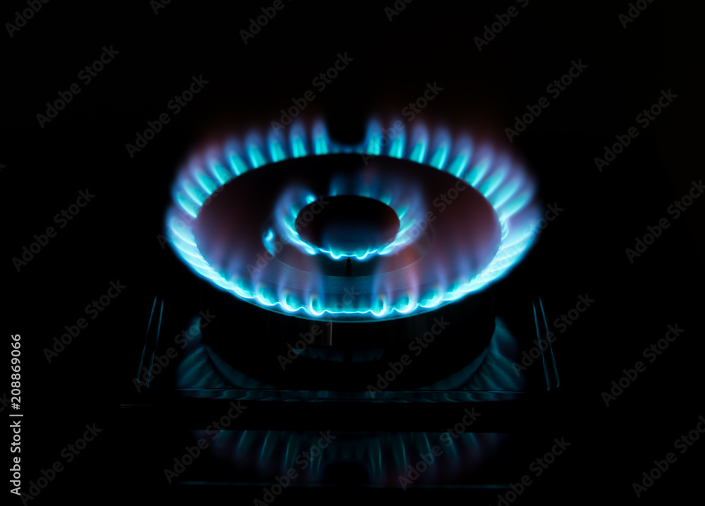 Gas stove burner on black background Gas stove burner on black background