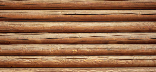 Logs on the wall with a log frame as a background