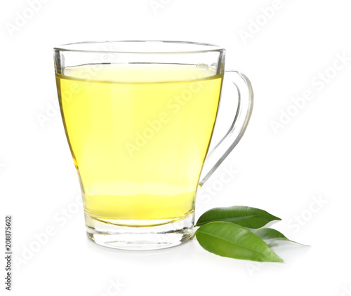 Glass cup with delicious green tea on white background