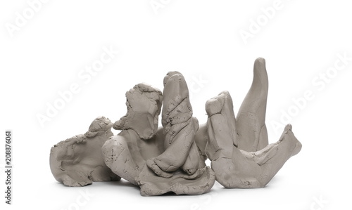 Grey modelling clay lumps, shapes isolated on white background