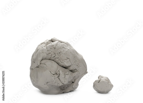Grey modelling clay round lumps, shapes isolated on white background