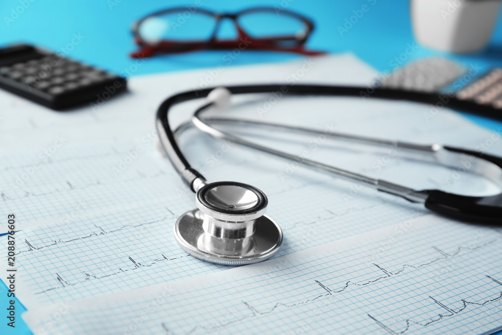 Stethoscope on cardiogram. Health care concept Stethoscope on cardiogram. Health care concept
