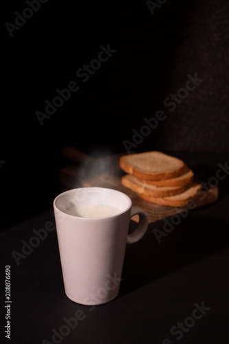 Toast with glass of hot milk. Breakfast