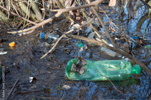 Plastic bottle floating in the water