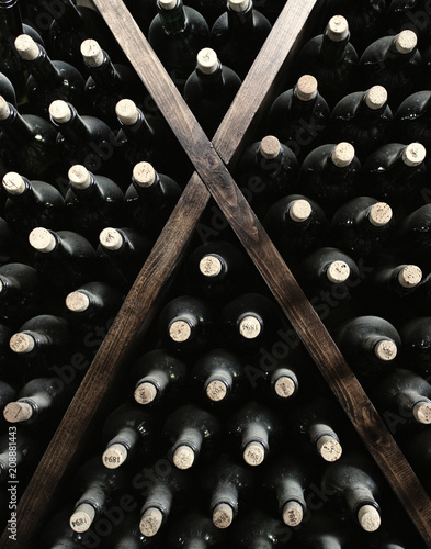 Stacked up wine bottles photo