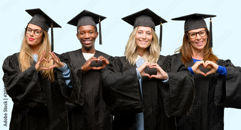 Education concept, university graduate woman and man group happy showing love with hands in heart shape expressing healthy and marriage symbol Education concept, university graduate woman and man group happy showing love with hands in heart shape expressing healthy and marriage symbol