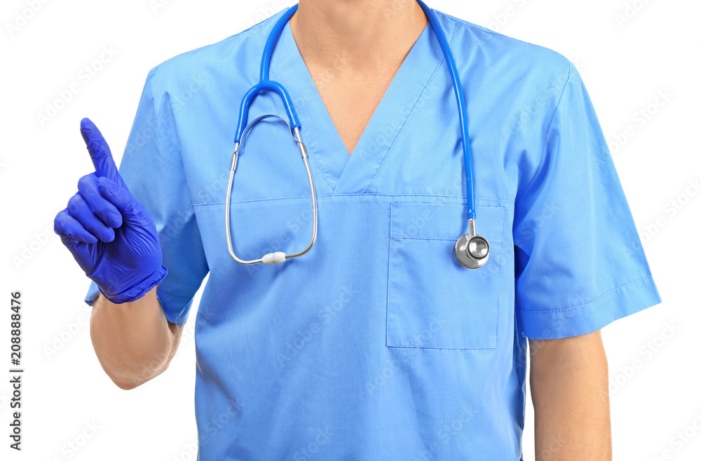 Male doctor showing something on white background Male doctor showing something on white background