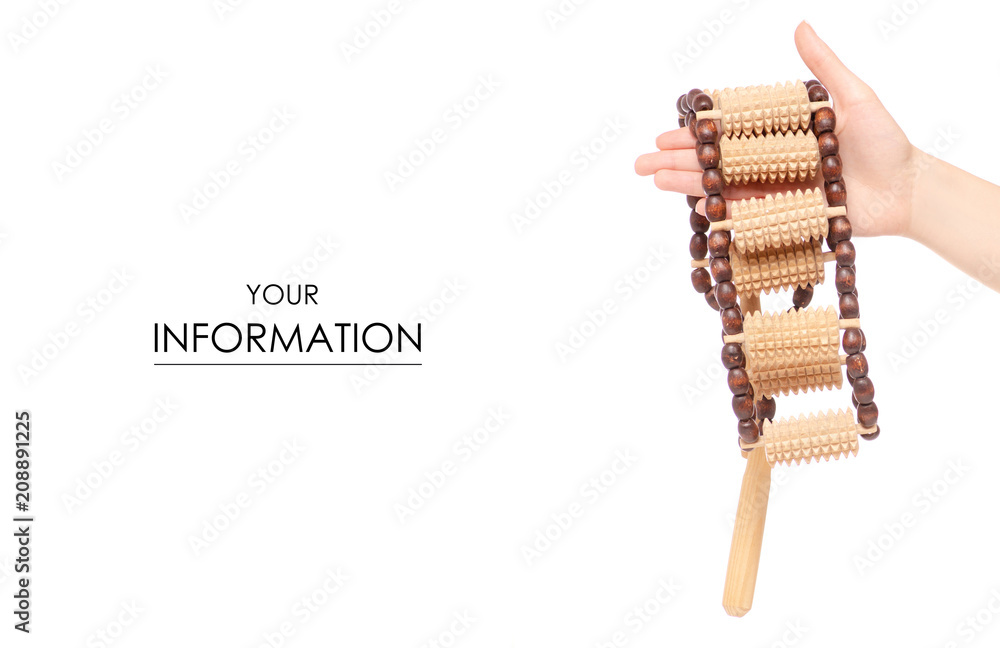 Wooden massager for the back in hand pattern on a white background isolation Wooden massager for the back in hand pattern on a white background isolation