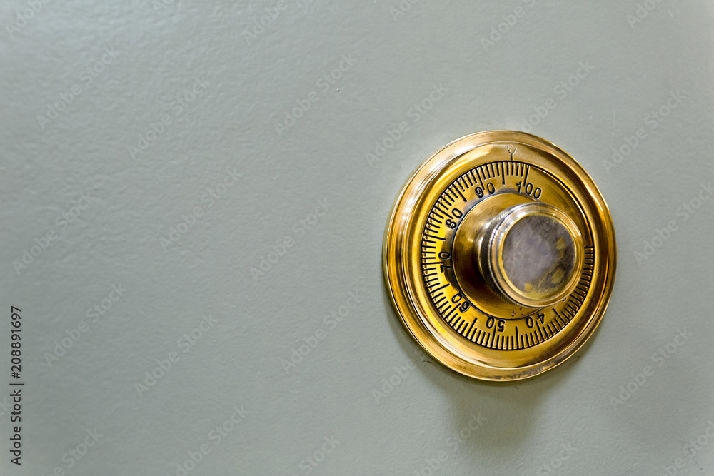 Combination safe lock, in golden duotone.