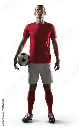 Soccer player standing on white background.