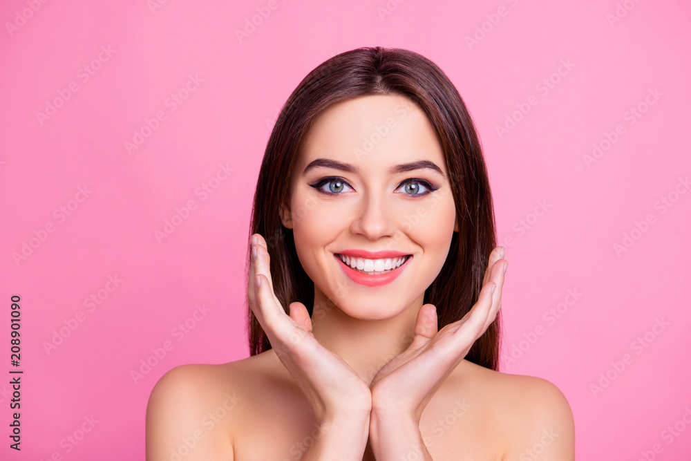 Close up portrait of cute pretty attractive beautiful woman with ideal flawless perfect pure clean skin making a shape her hands, isolated on pink background Close up portrait of cute pretty attractive beautiful woman with ideal flawless perfect pure clean skin making a shape her hands, isolated on pink background