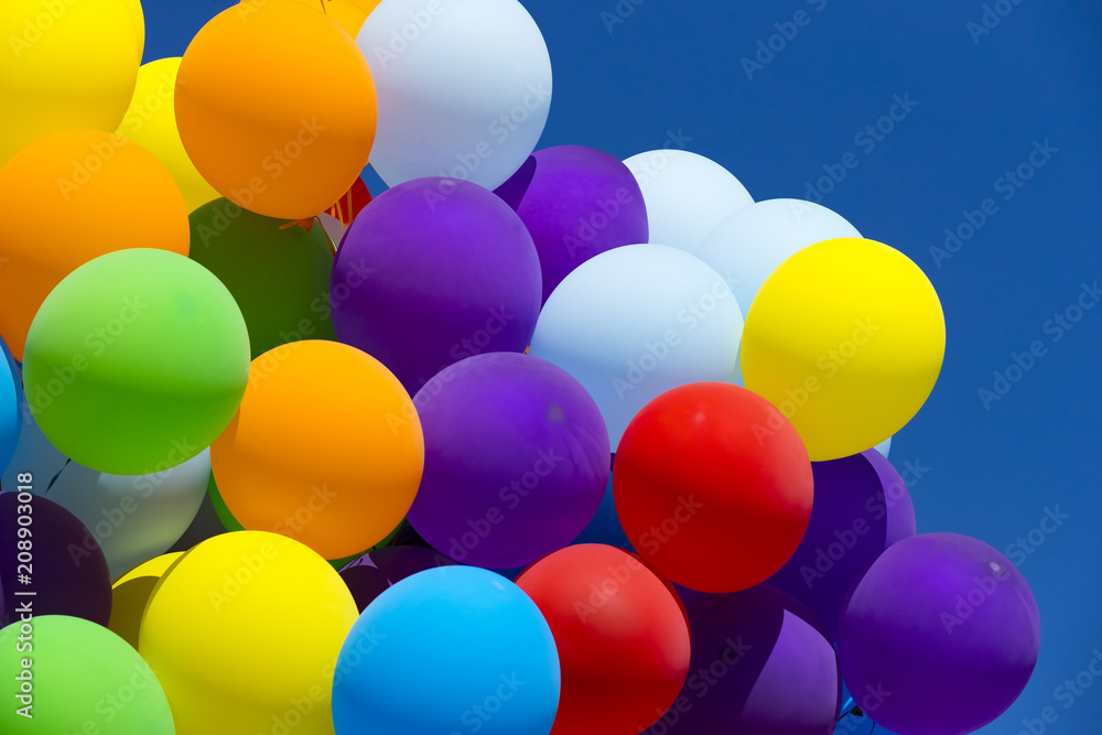 Background of a set of colored balloons on the sky background Background of a set of colored balloons on the sky background