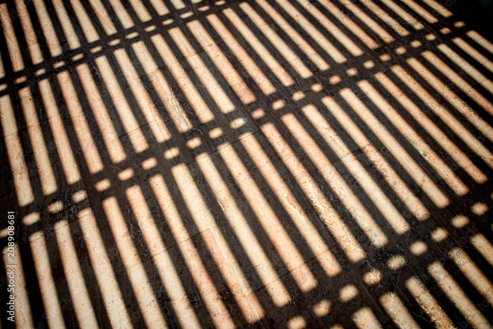 Shadows of gate bars Shadows of gate bars