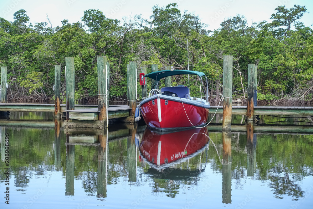 Obraz premium Red Boat Docked Florida