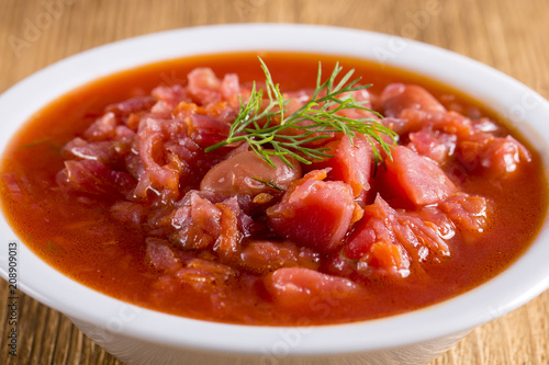 Vegetable soup - red borsch, closeup. Healthy beetroot soup, vegetarian food. Ukrainian and russian national food - red beet soup, borscht