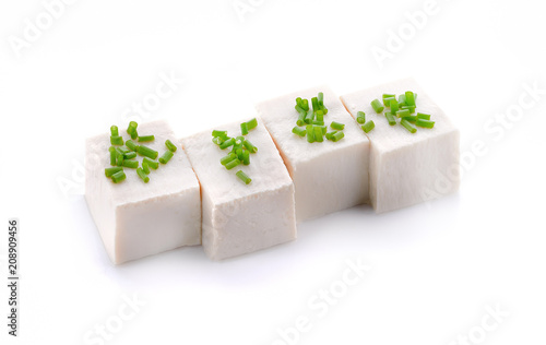 Tofu cubes isolated on white background.