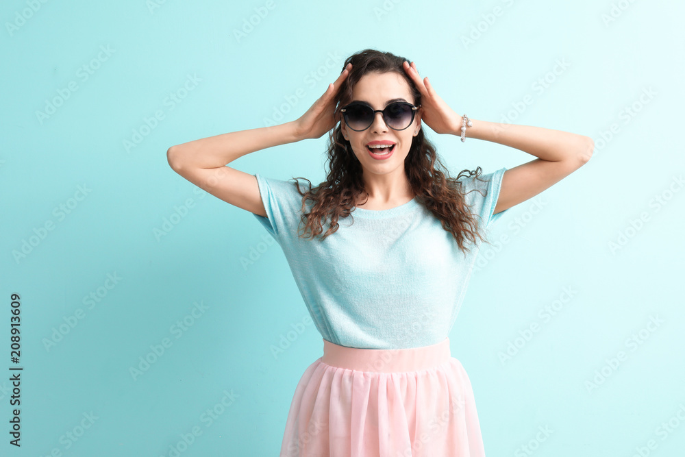 Beautiful young woman on color background Beautiful young woman on color background