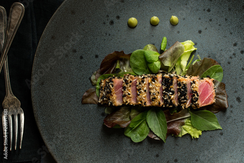 Grilled Sliced Tuna Steak in Sesame with Salad and Wasabi Sauce