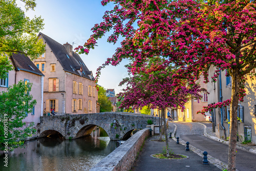 Eure River embankment with old houses in a small town Chartres, France