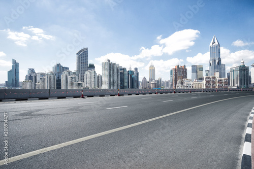empty road with city skyline