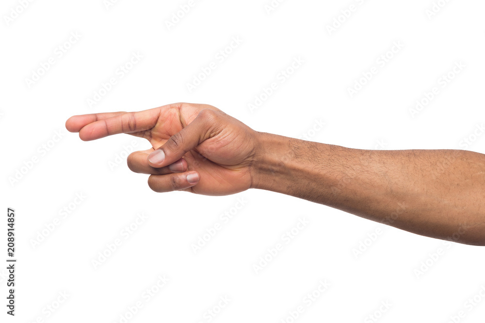 Black hand crossed fingers fo luck isolated on white Black hand crossed fingers fo luck isolated on white
