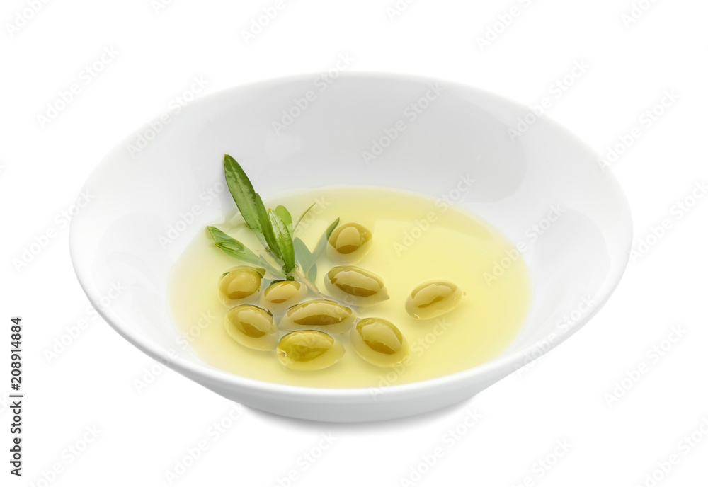 Bowl with oil and canned olives on white background Bowl with oil and canned olives on white background