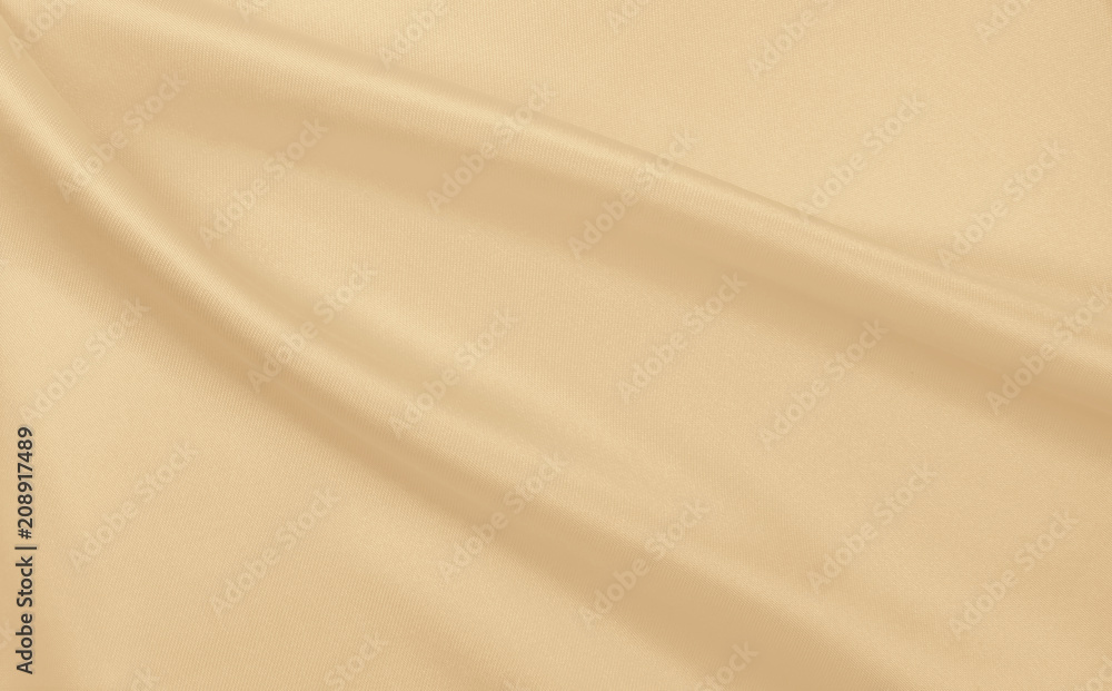 Smooth elegant golden silk or satin luxury cloth texture as wedding background. Luxurious background design. In Sepia toned. Retro style