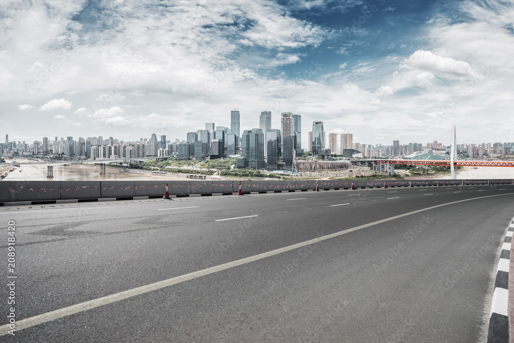 empty road with city skyline