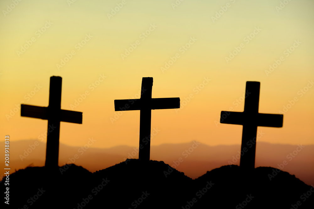 Crucifixion Of Jesus Christ At Sunrise - Silhouette Three Crosses On Hill Crucifixion Of Jesus Christ At Sunrise - Silhouette Three Crosses On Hill