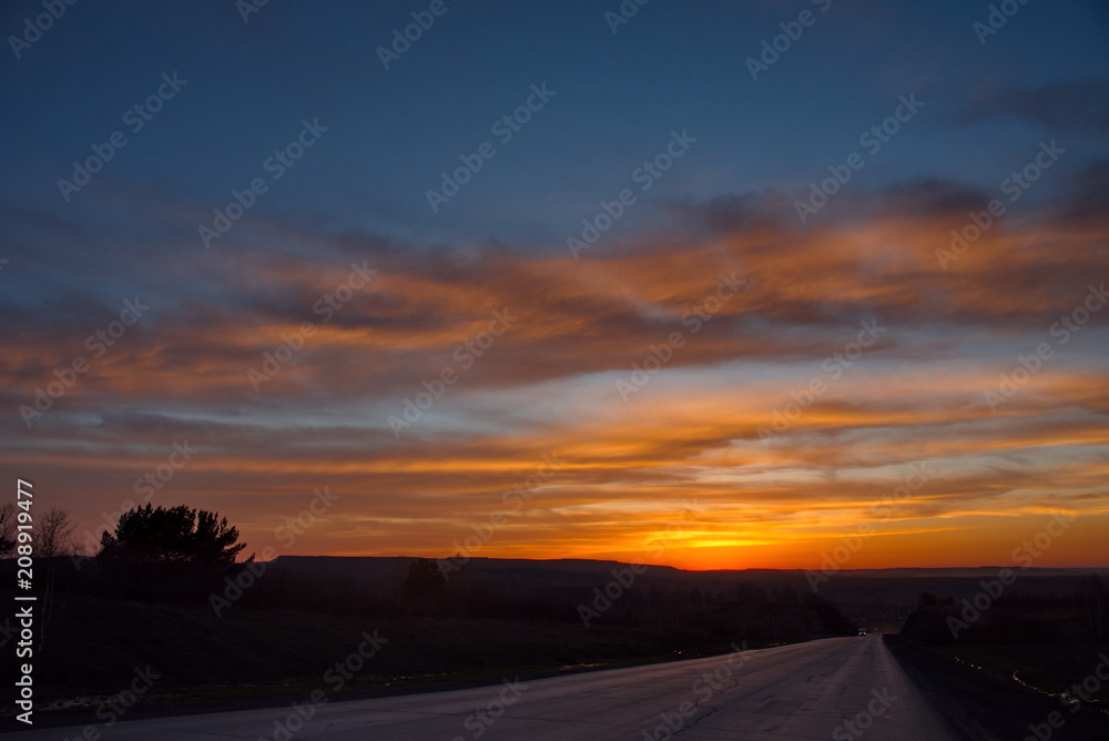 Russia. The South Of Western Siberia. Evening sunset in early spring in the mountain Shoria Russia. The South Of Western Siberia. Evening sunset in early spring in the mountain Shoria
