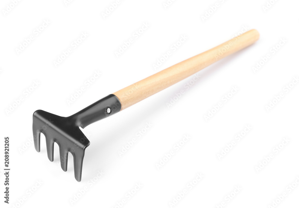 Metal rake for gardening on white background Metal rake for gardening on white background