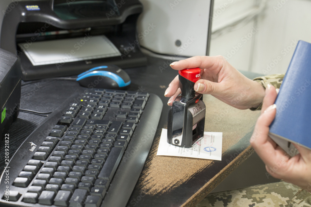 Ukrainian passport. Border Control check in. The process of stamping of ...