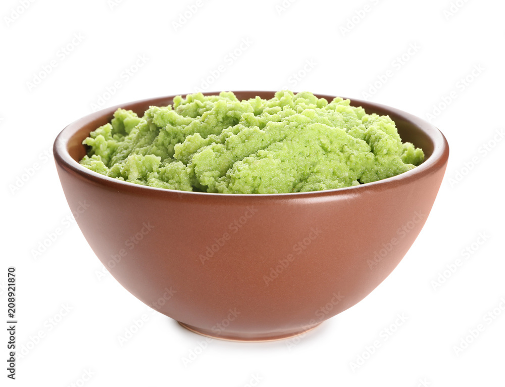 Bowl with delicious guacamole on white background Bowl with delicious guacamole on white background