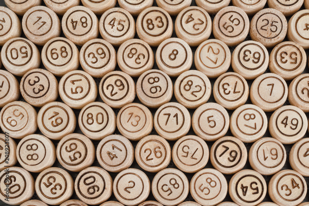 Background of wooden barrels lotto. Close-up Background of wooden barrels lotto. Close-up