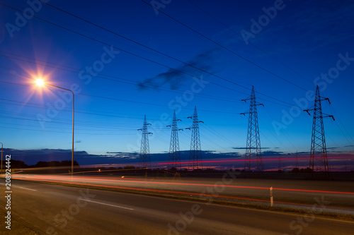 The high voltage towers is in the evening