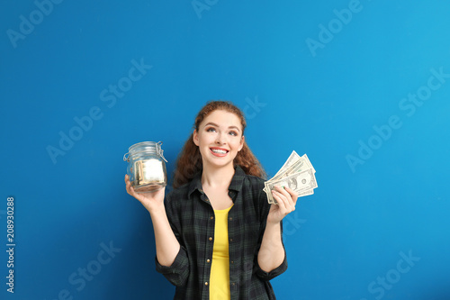 Young woman holding glass j...