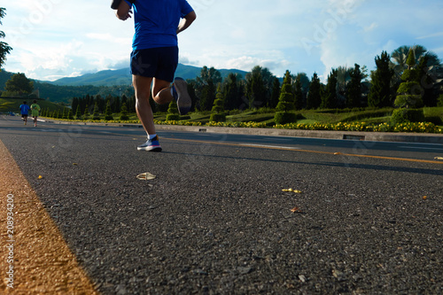 Group of people running race marathon © Somkiat