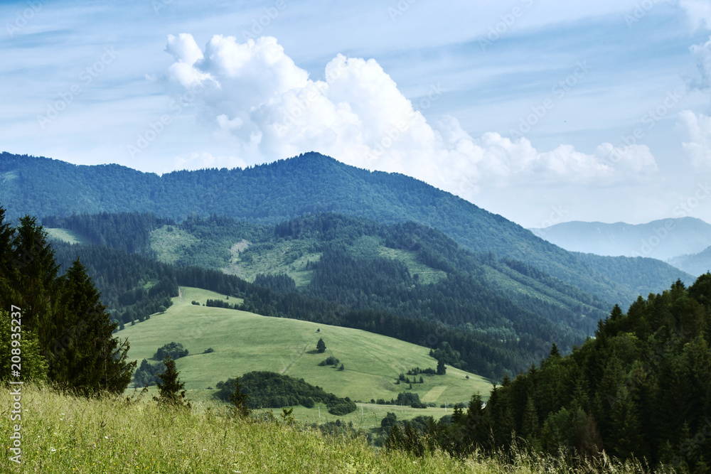 Beautiful sunny landscape with hills, forests and meadows in Slovakia