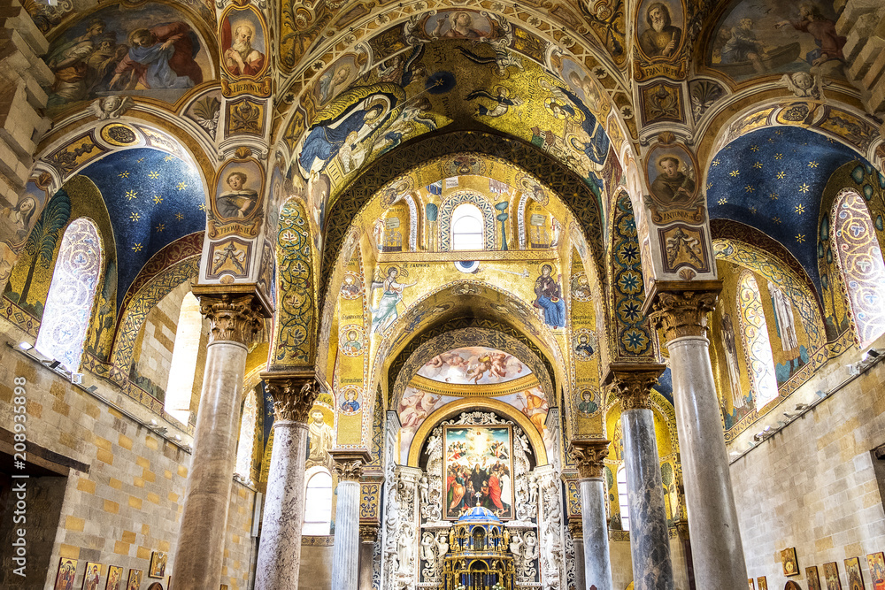 The vault decorated with beautiful Byzantine mosaics of the 12th century and the newer part is decorated with later frescoes the 18th century in the Martorana church.