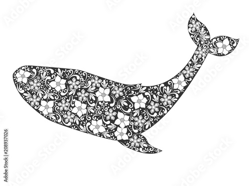 Silhouette of whale with floral ornament. Vector illustration