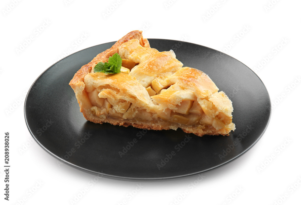 Plate with piece of tasty homemade apple pie on white background